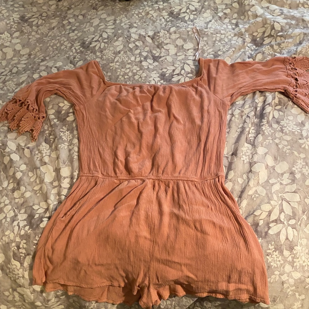 Long sleeve light pink romper